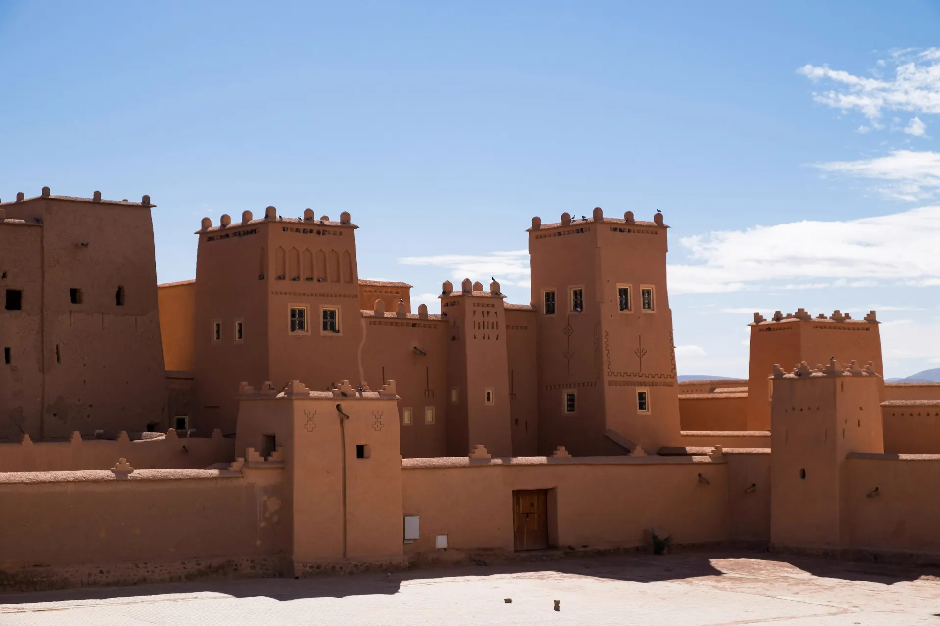 Kasbah in Ouarzazate under a blue sky